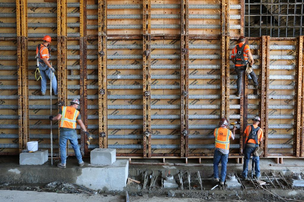 Outside image of a construction site with some worker