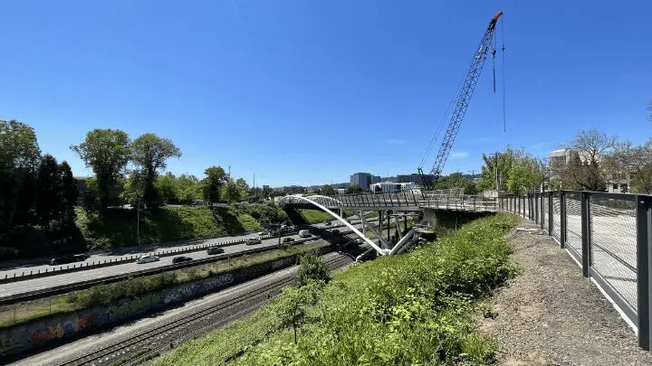 A bridge over the river is being built.